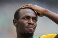 Usain Bolt looks on during the IAAF World Championships 2011 - (Source: Getty)